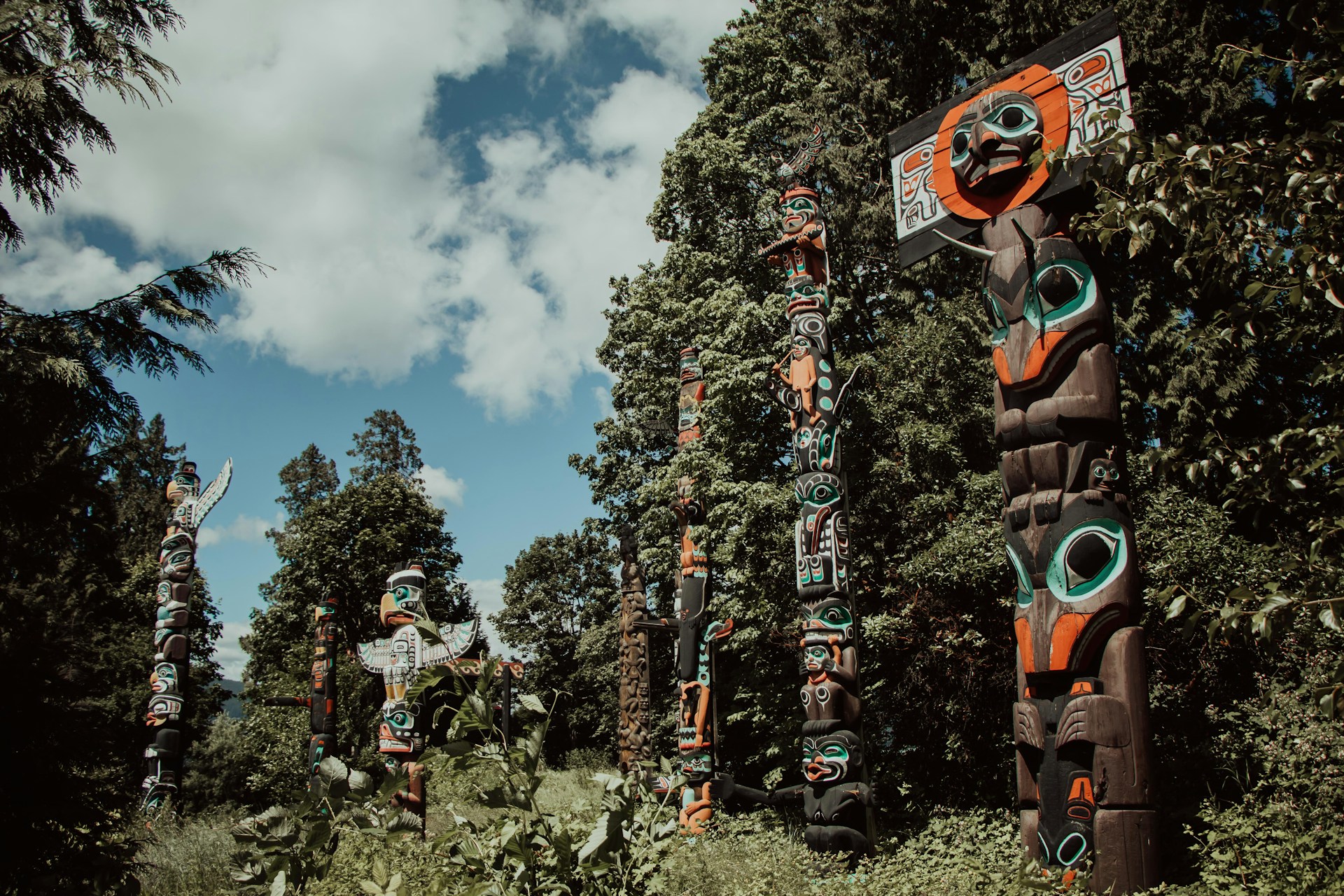 Stanley Park totem poles, photographed from a low angle looking up 