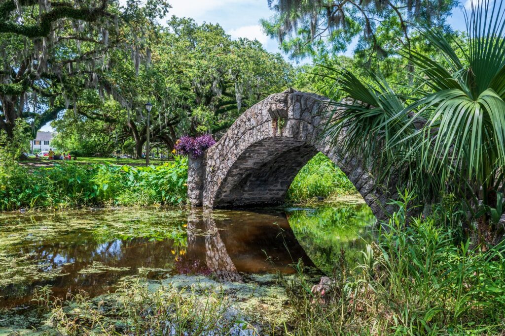 Image of Langles Bridge in New Orleans City Park is one of three stone foot bridges in the park built in 1902