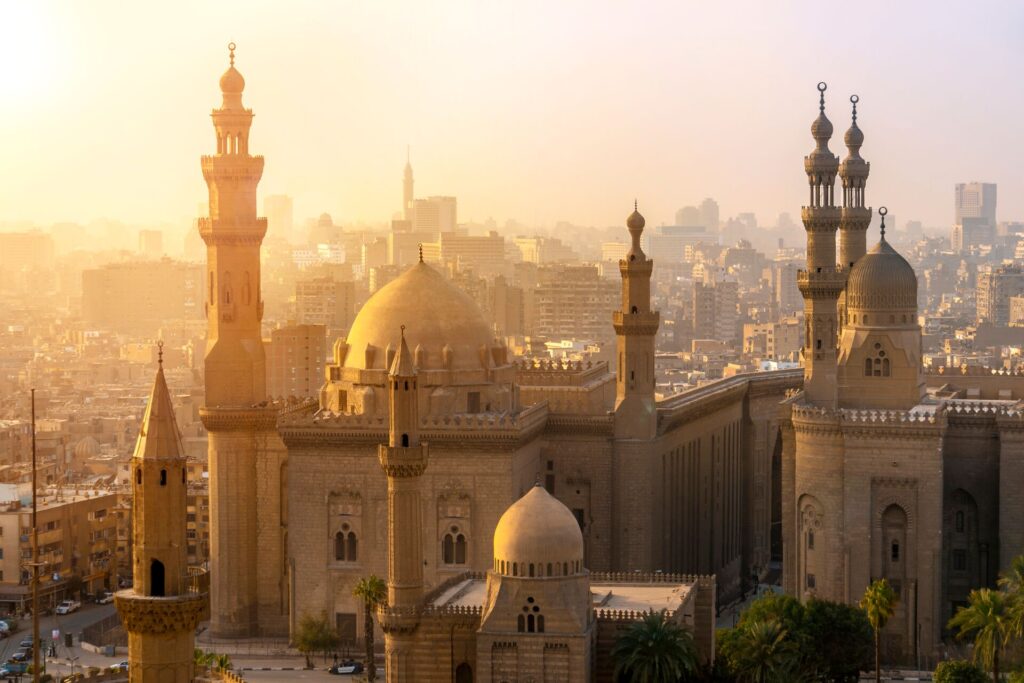 view of the Mosques of Sultan Hassan and Al-Rifai, glinting in the morning sunshine