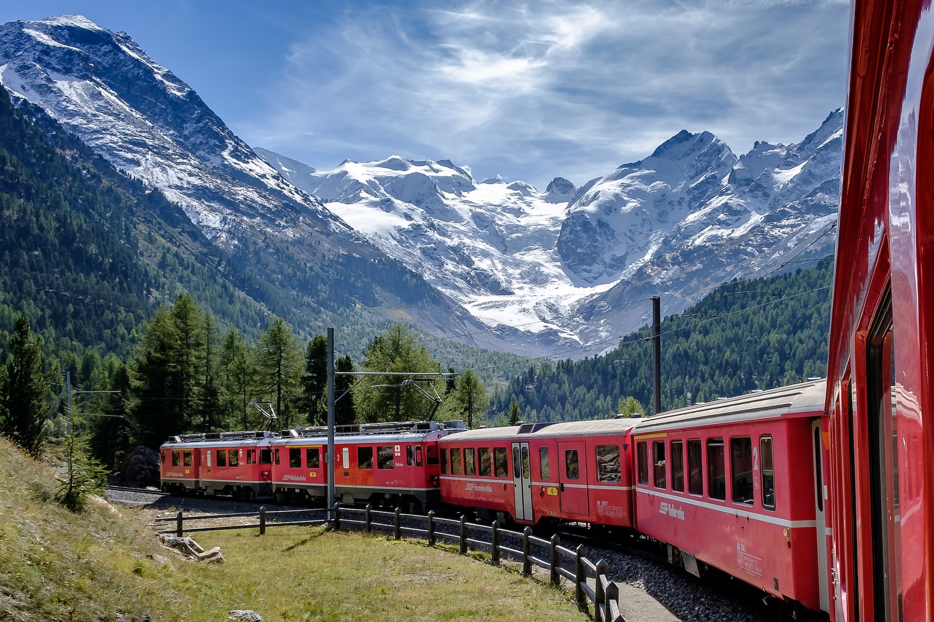 View from a carriage on the Glacier Express as it approaches the Swiss Alps
