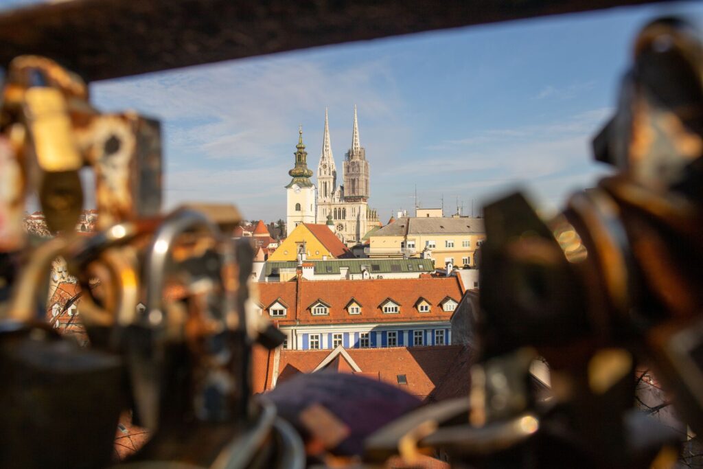 Zagreb cathedral is pictured through a keyhole lens framed by ornamental detail of a building