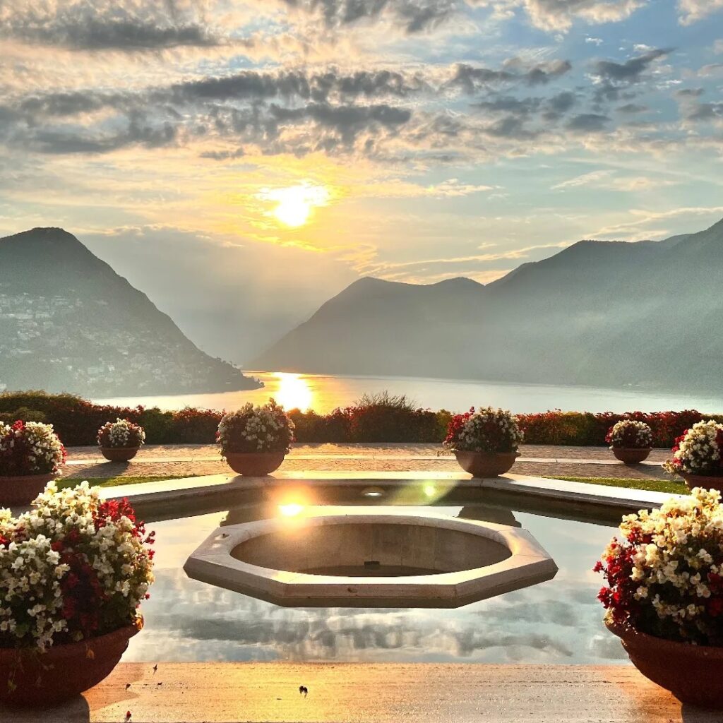 Hotel plunge pool overlooking the Swiss lakes at sunset