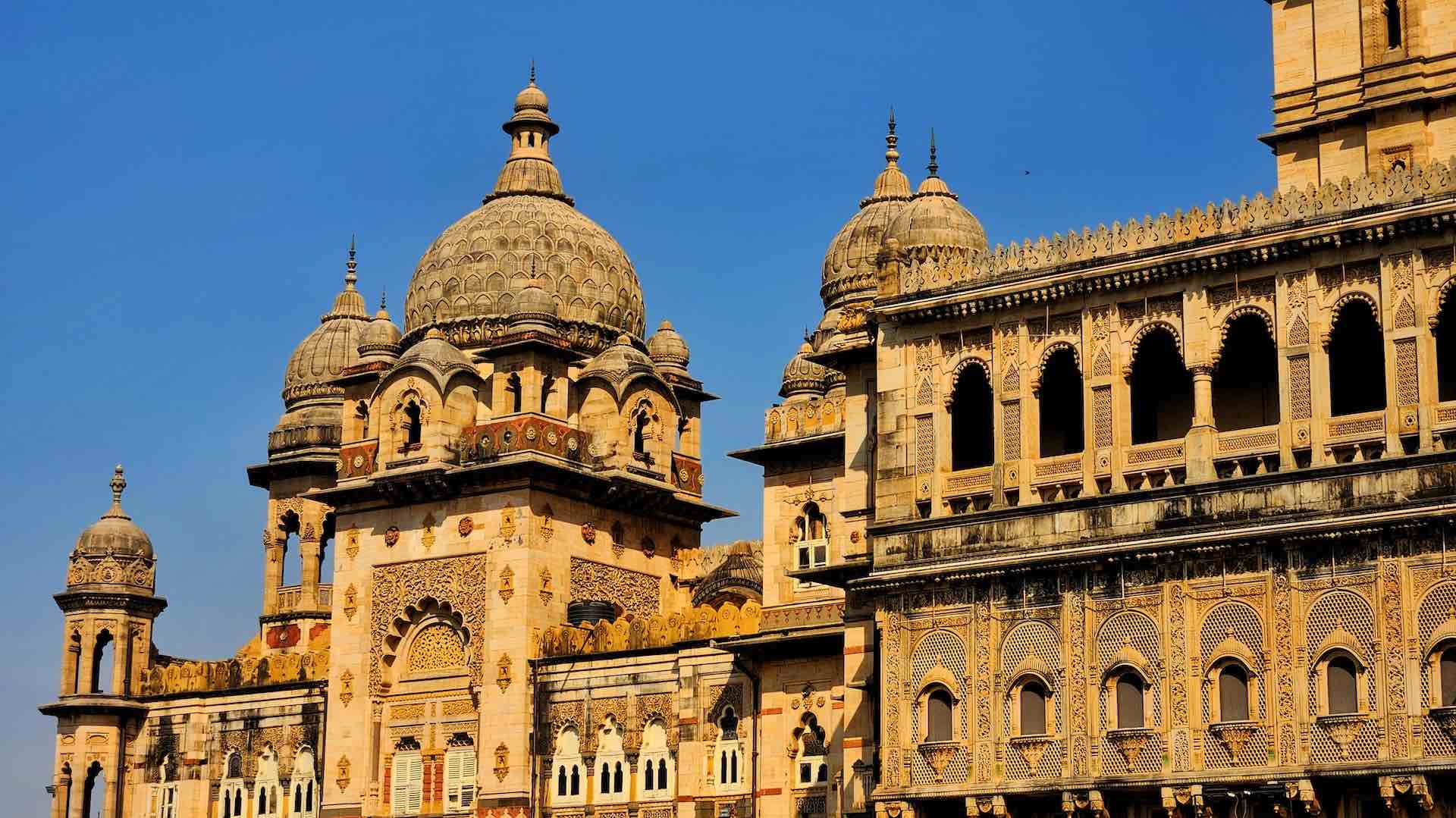 Close up of Laxmi Vilas Palace with blue sky in background