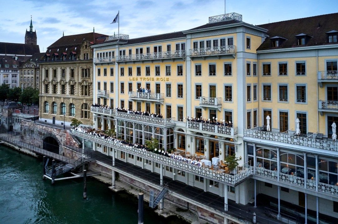 Front elevation of Hotel Les Trois Rois with body of water in foreground, Basel, Switzerland 