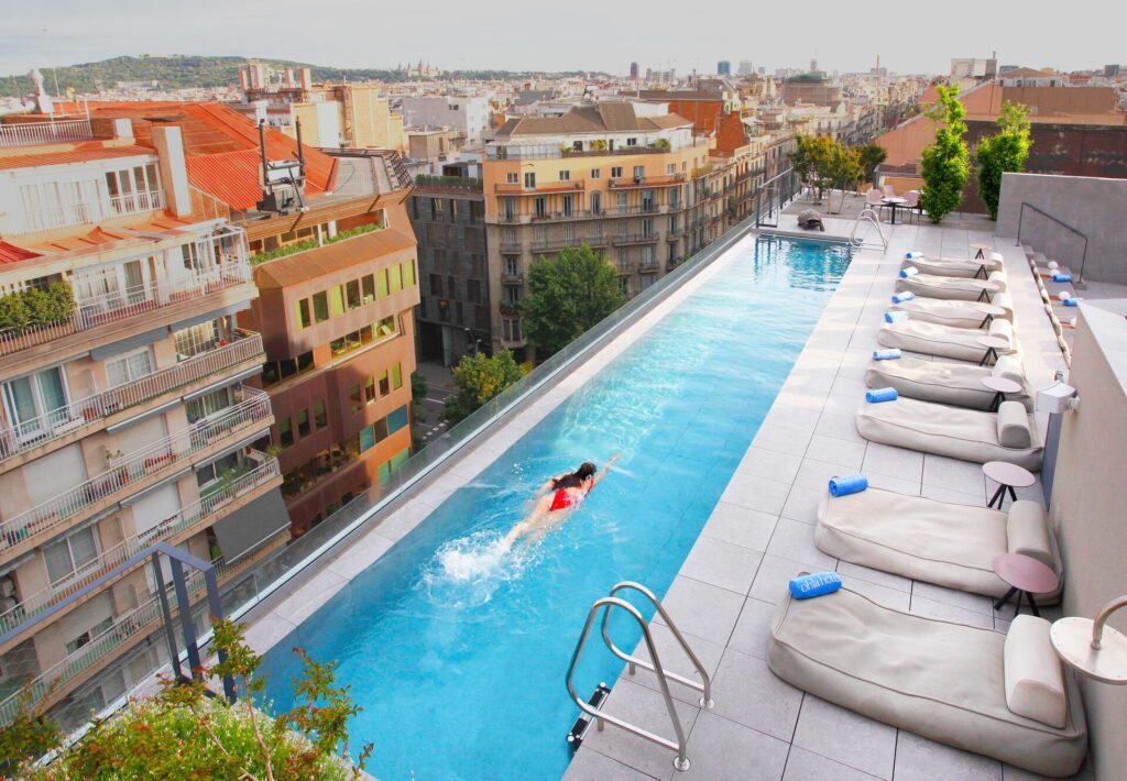 Bright blue rooftop pool at the Ohla Eixample hotel Barcelona